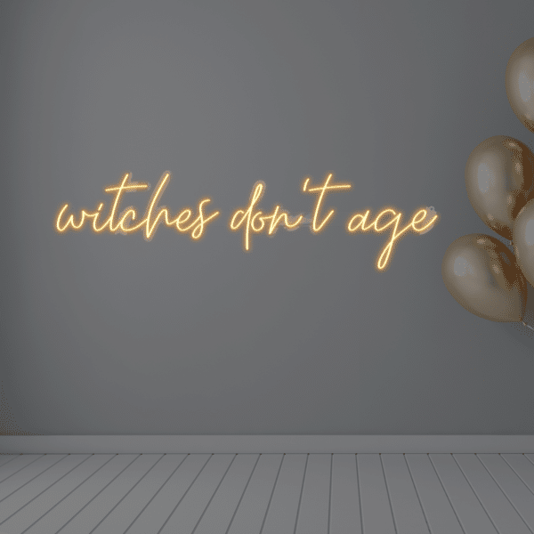 Napis LED Witches Don't Age